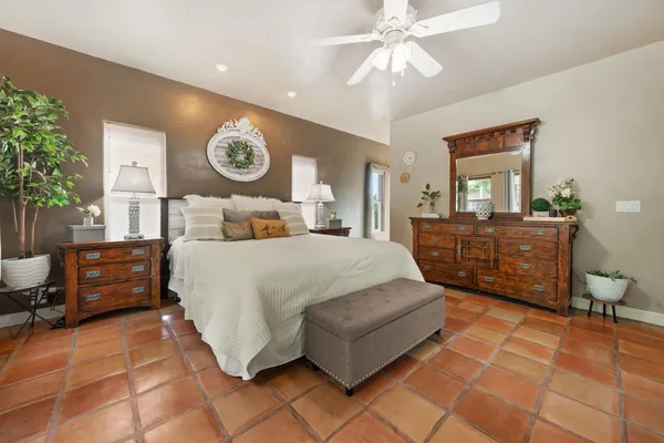 a bathroom with a double vanity sink mirror and shower