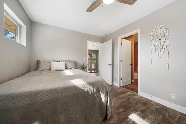 a view of a house with backyard porch and sitting area