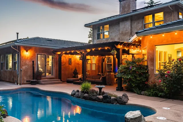 a front view of a house with yard