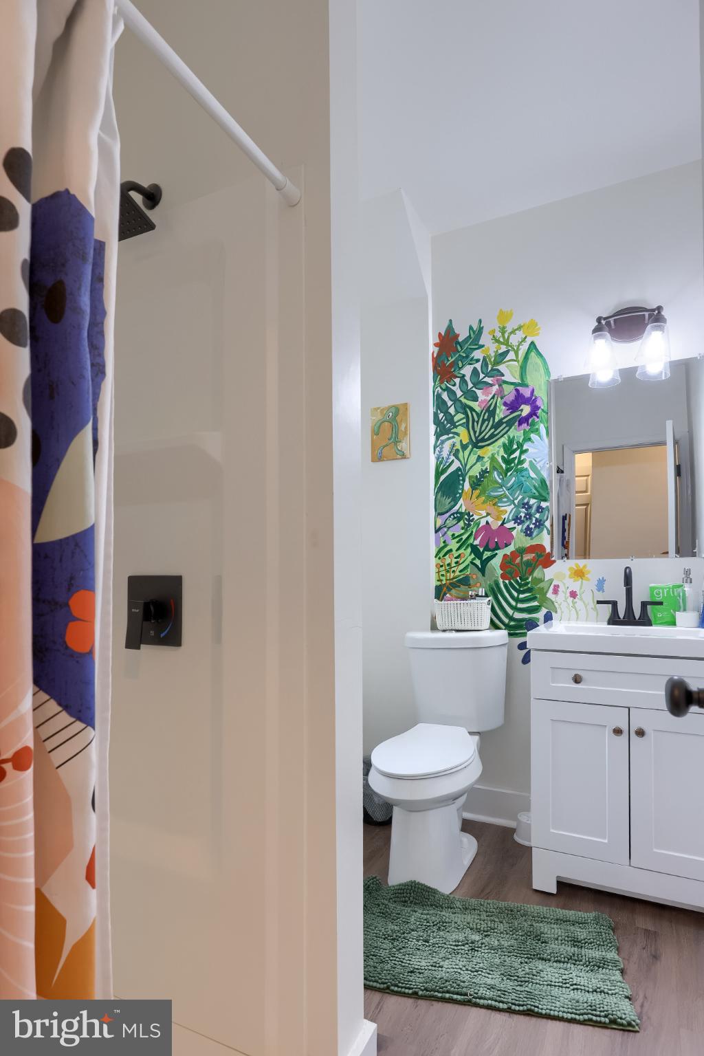 1061 Hay Street York, PA 17403 - Photo 29 of 32 Vibrant bathroom with tropical mural accents.