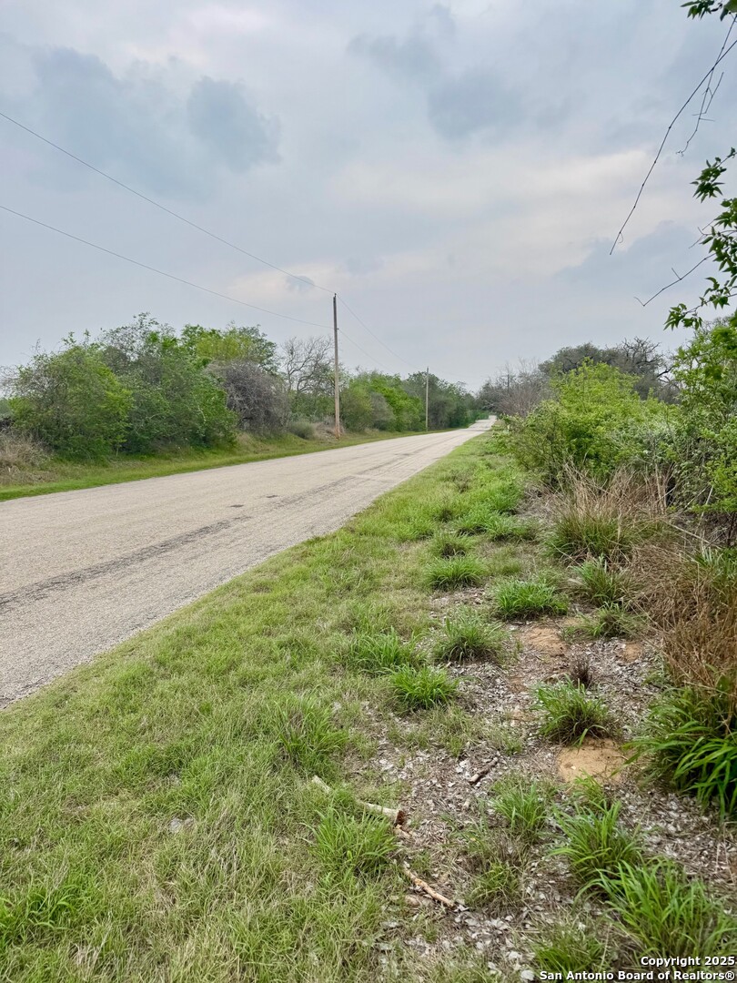428 Horton Road Poteet, TX 78065 - Photo 12 of 28 a view of a field with an trees