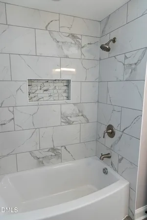 a bathroom with a bathtub