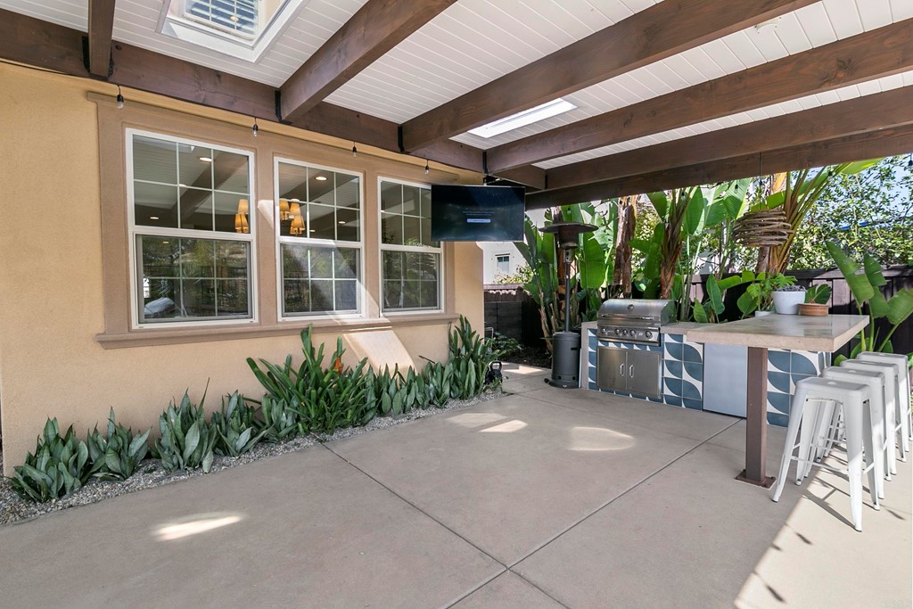 7001 Sitio Frontera Carlsbad, CA 92009 - Photo 34 of 40 a view of a porch with chairs and backyard