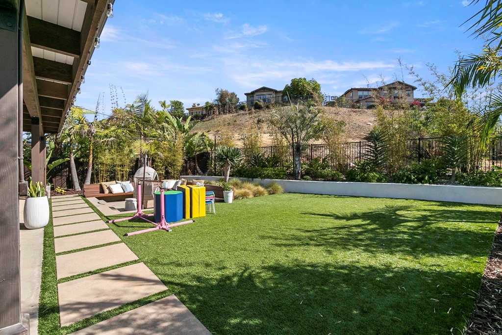 7001 Sitio Frontera Carlsbad, CA 92009 - Photo 35 of 40 a view of a swimming pool with an outdoor seating