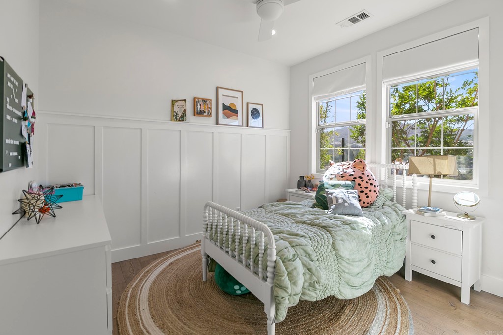 7001 Sitio Frontera Carlsbad, CA 92009 - Photo 40 of 40 a bedroom with a bed and a window