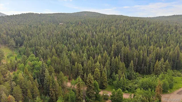 a view of mountain view with mountains in the background