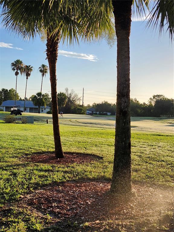 1216 Rio De Janeiro Avenue, Unit 301 Punta Gorda, FL 33983 - Photo 6 of 15 a view of a swimming pool and an ocean view