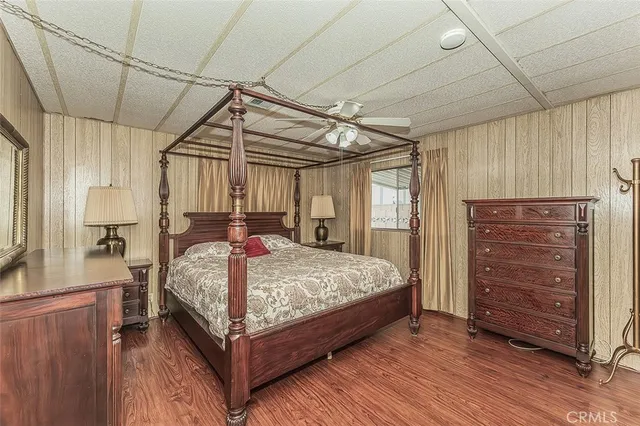 a bed room with a bed and a window