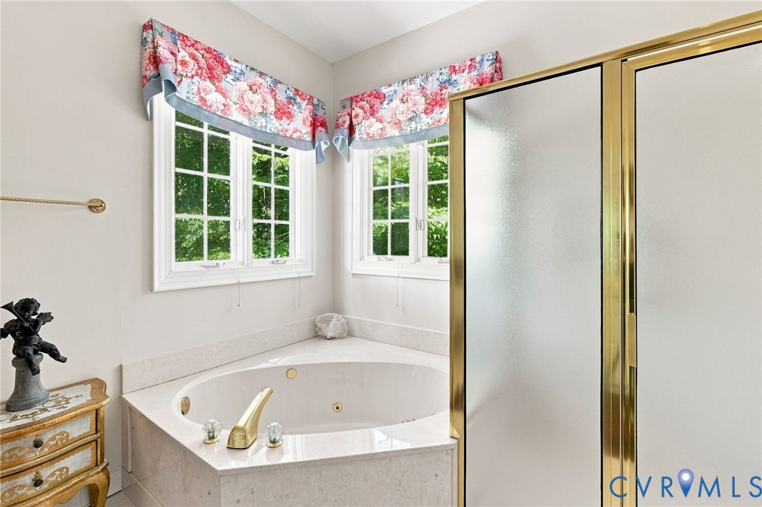 3950 Reeds Landing Circle Midlothian, VA 23113 - Photo 22 of 49 Corner jetted tub with polished brass fixtures and