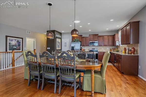 a view of a dining room with furniture
