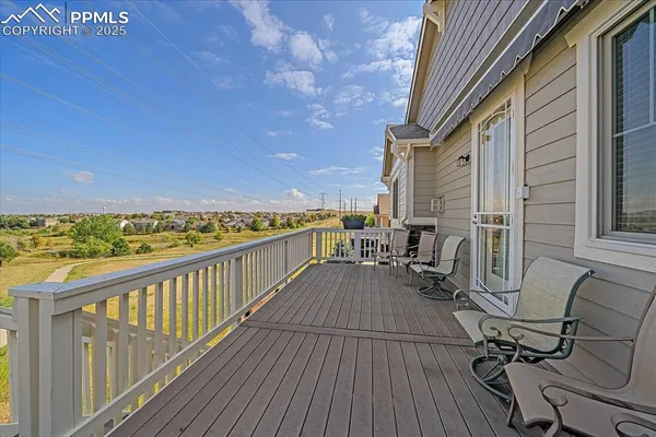 a view of balcony with furniture