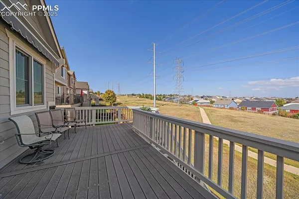 a view of balcony with furniture