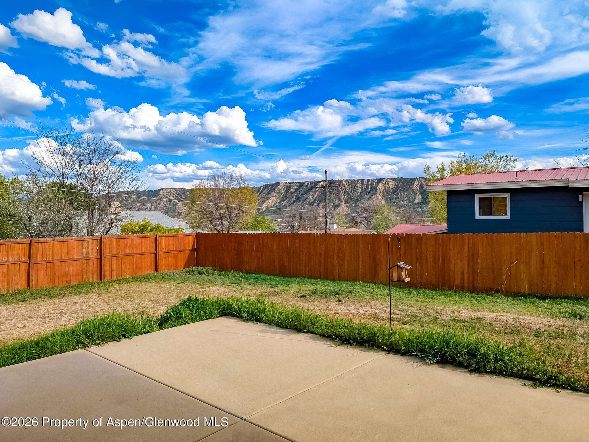 410 Fairway Avenue Rifle, CO 81650 - Photo 33 of 37 a view of a backyard with a garden