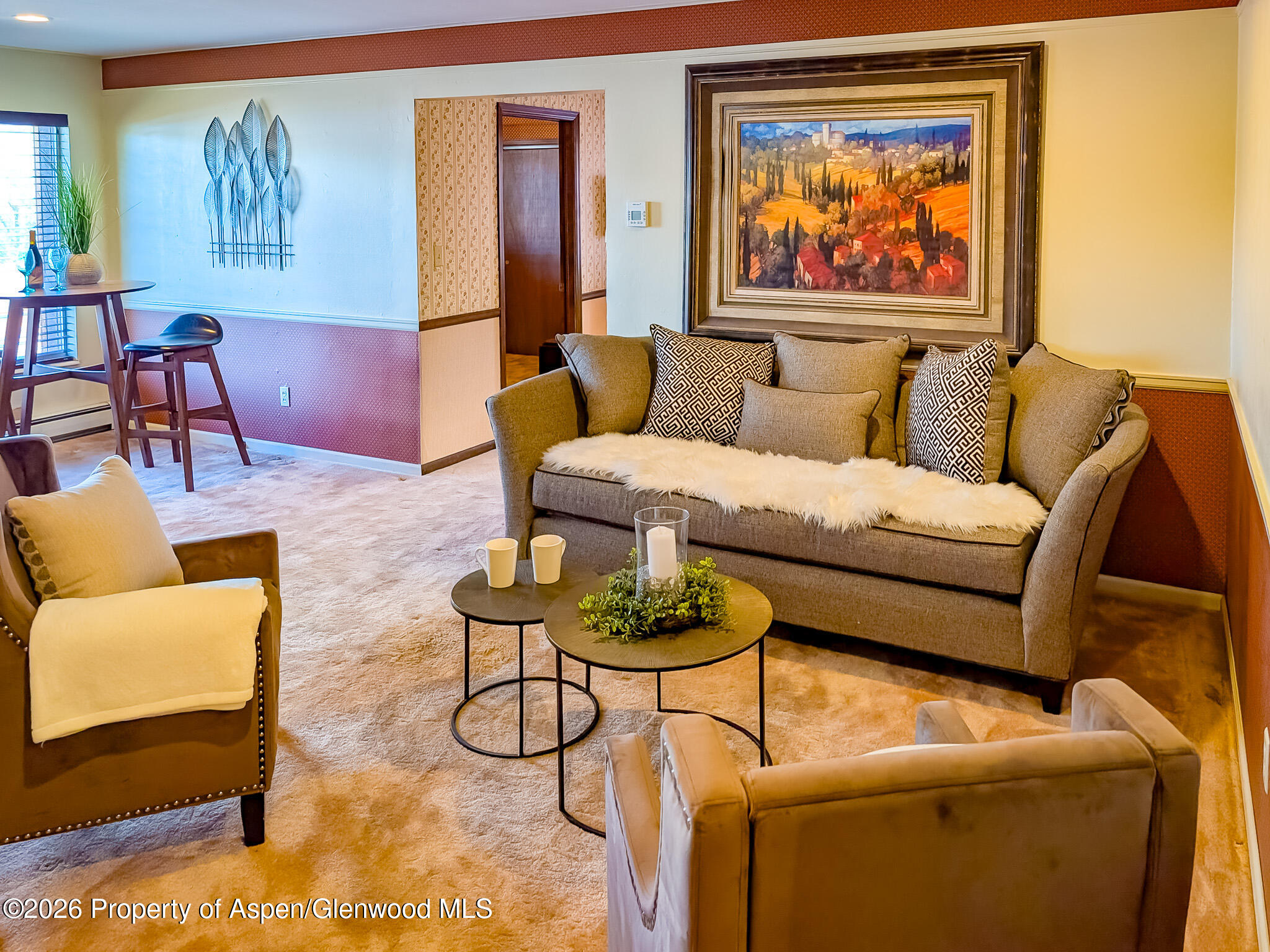 410 Fairway Avenue Rifle, CO 81650 - Photo 5 of 37 a living room with furniture and a wooden floor