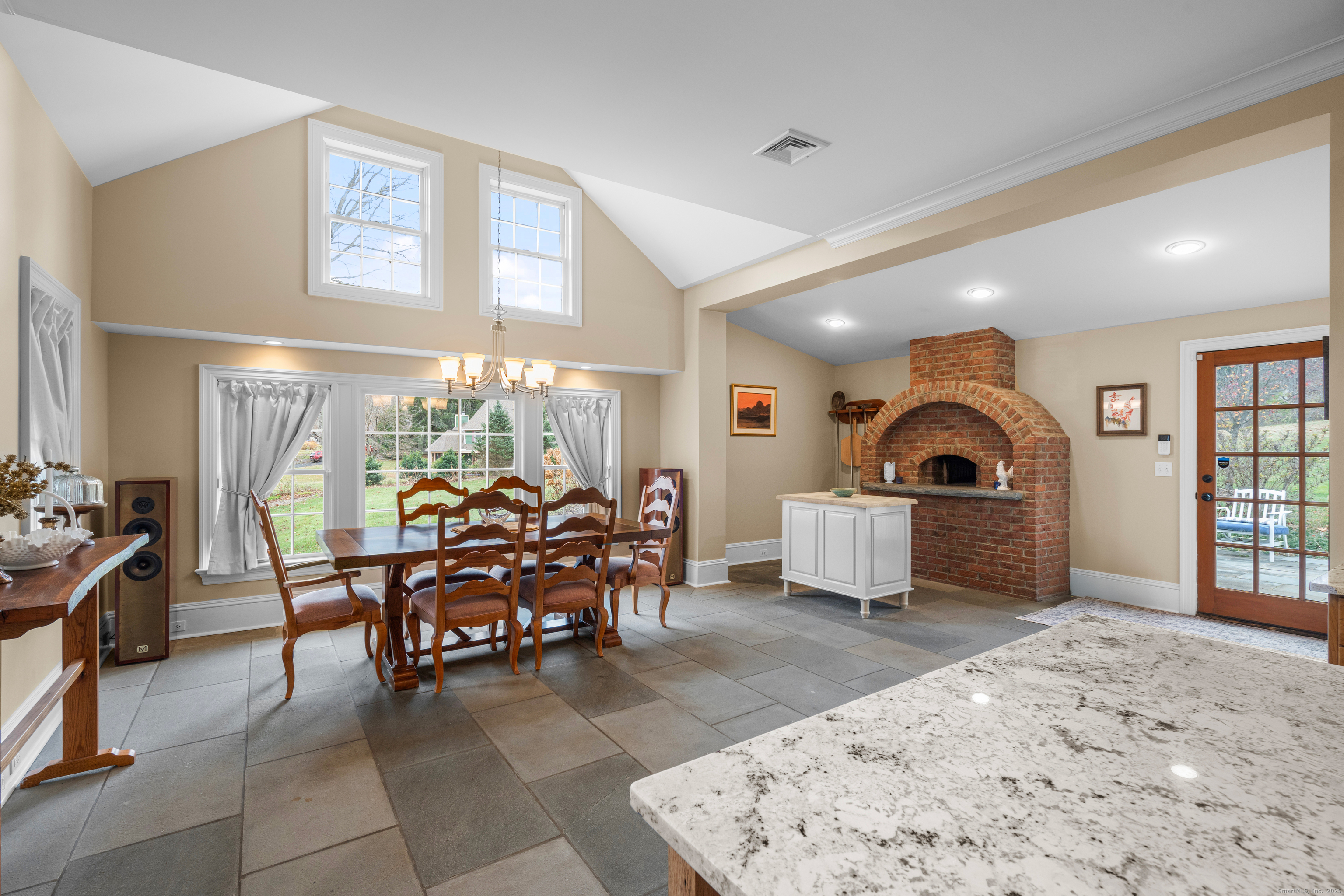 40 Plaster House Road Southbury, CT 06488 - Photo 14 of 40 a living room with furniture a chandelier and a large window