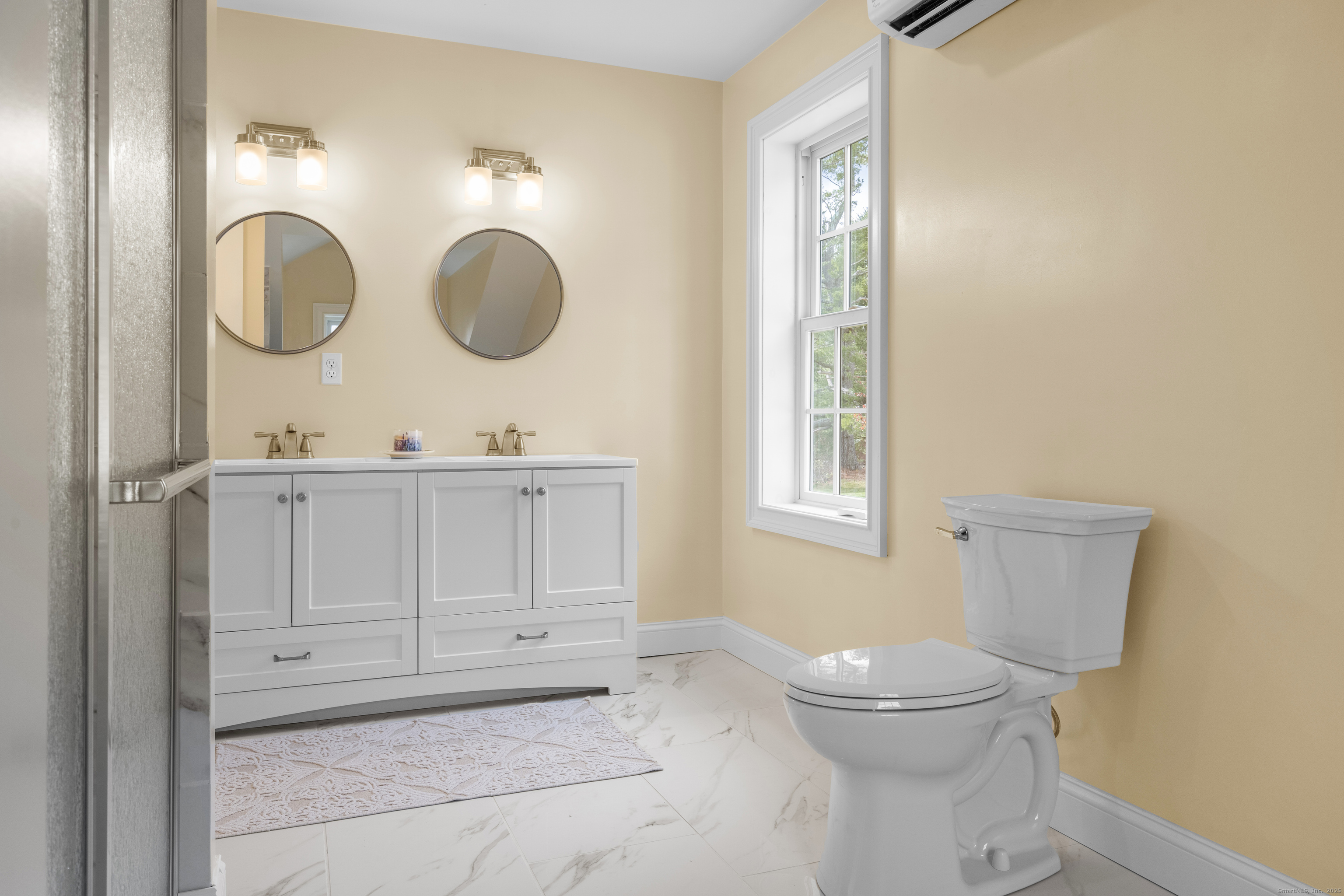 40 Plaster House Road Southbury, CT 06488 - Photo 26 of 40 a bathroom with a toilet a sink and a mirror