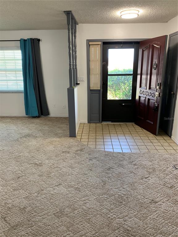 4661 Anderson Road, Unit 4661 Kissimmee, FL 34746 - Photo 2 of 14 an empty room with window