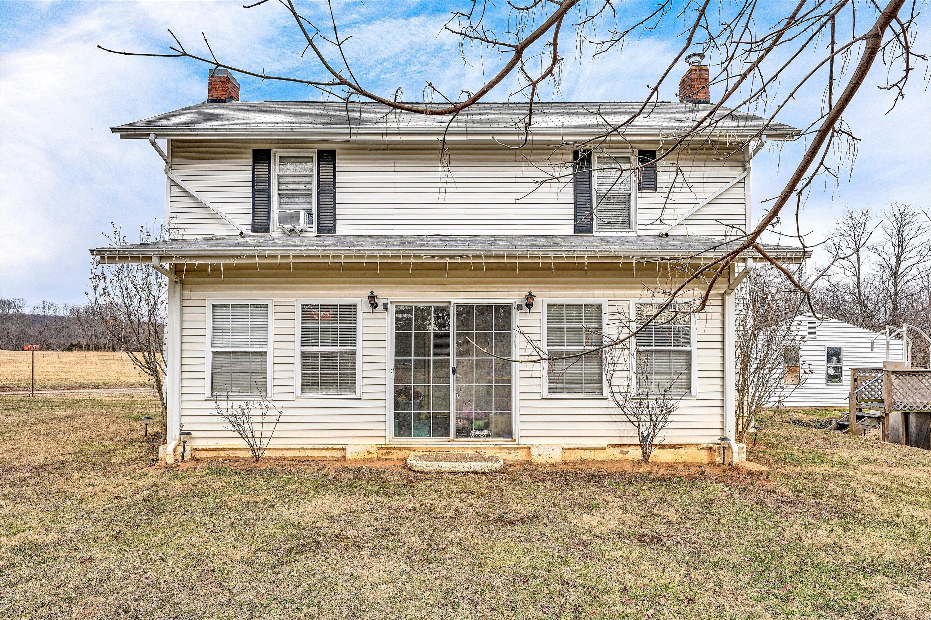 1045 Emerald Drive Goodview, VA 24095 - Photo 2 of 46 a front view of a house with a garage