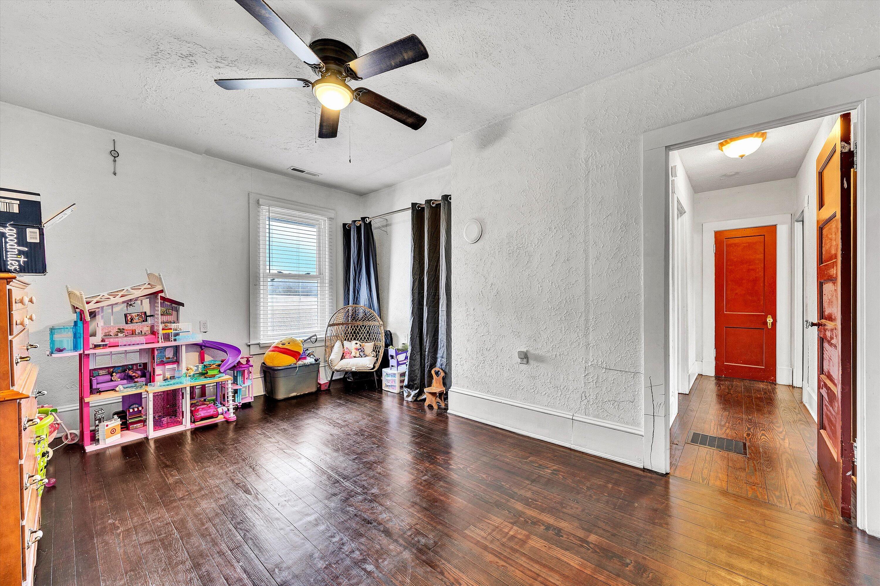 1045 Emerald Drive Goodview, VA 24095 - Photo 25 of 46 a view of livingroom with furniture and wooden floor