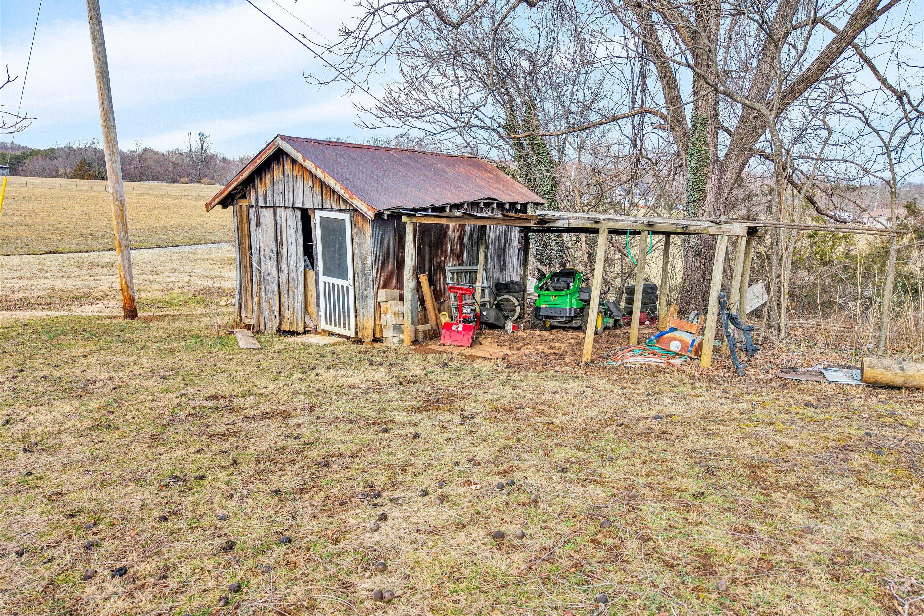 1045 Emerald Drive Goodview, VA 24095 - Photo 31 of 46 a view of outdoor space yard and patio