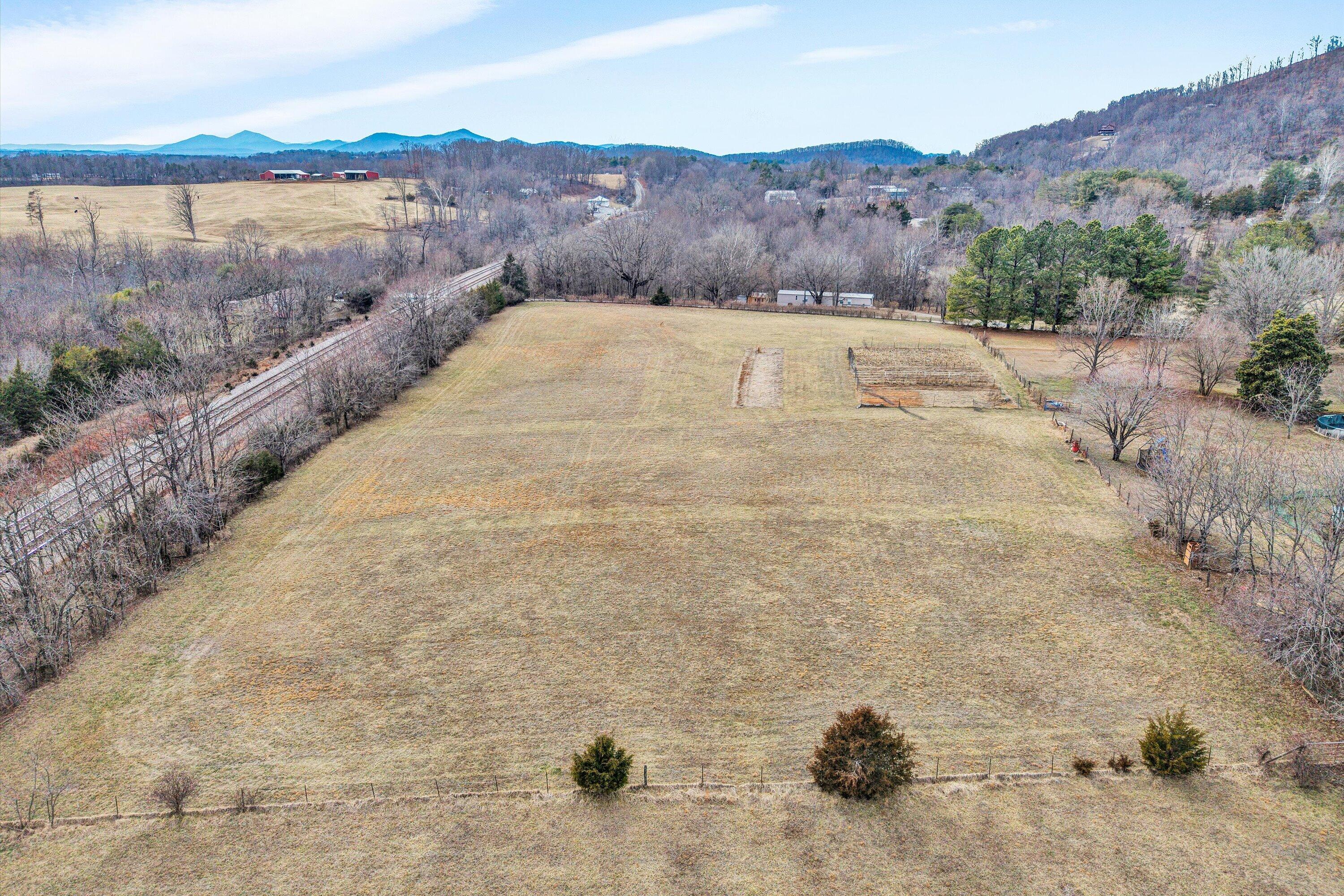 1045 Emerald Drive Goodview, VA 24095 - Photo 33 of 46 a view of an outdoor space and a lake view