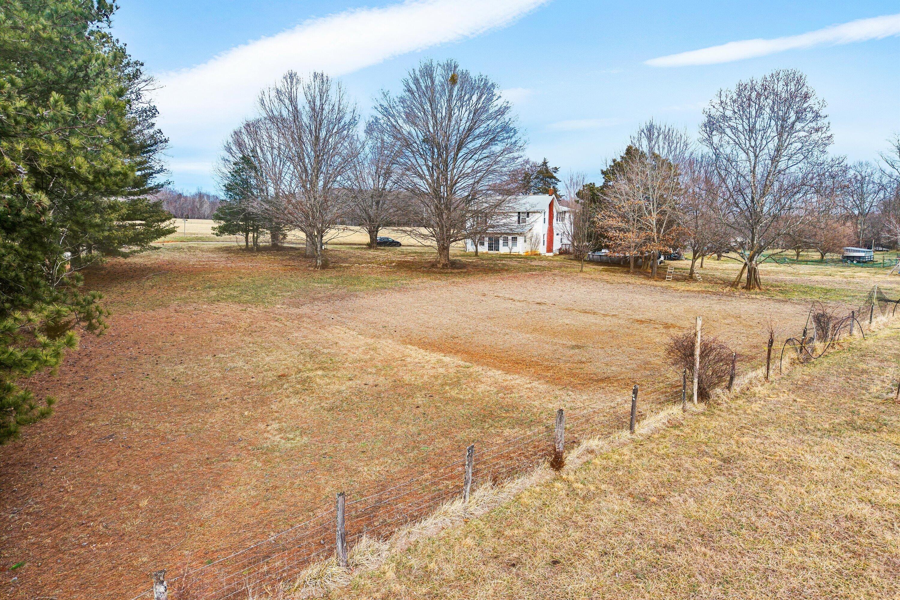 1045 Emerald Drive Goodview, VA 24095 - Photo 36 of 46 a view of city street with snow on the roadside