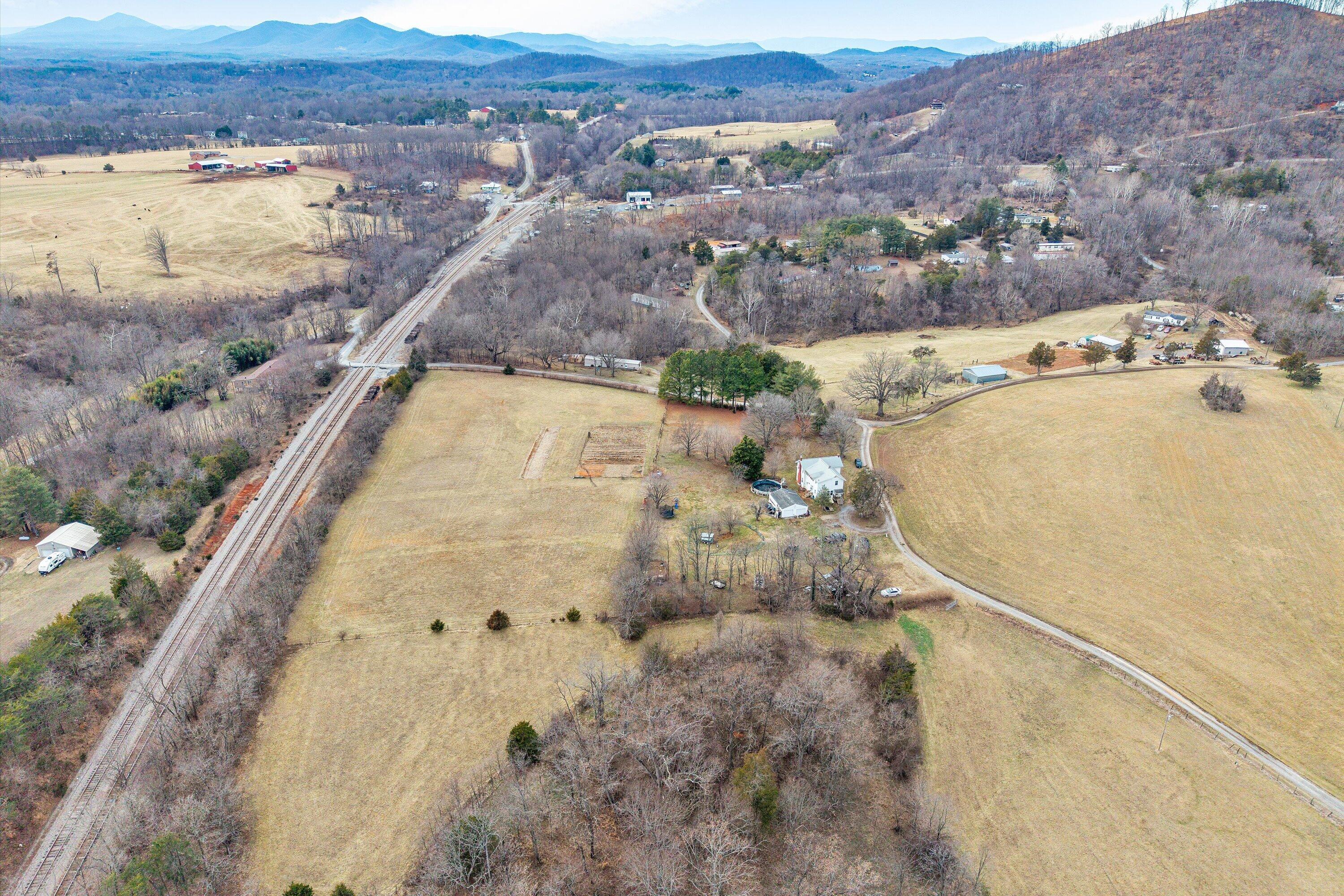 1045 Emerald Drive Goodview, VA 24095 - Photo 4 of 46 an aerial view of residential houses with outdoor space