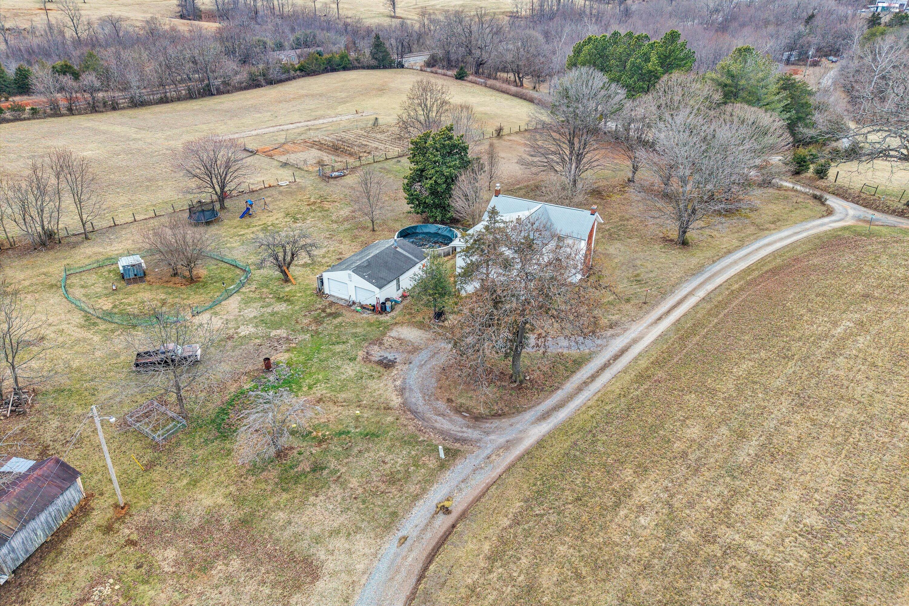 1045 Emerald Drive Goodview, VA 24095 - Photo 5 of 46 a view of a yard with an outdoor space