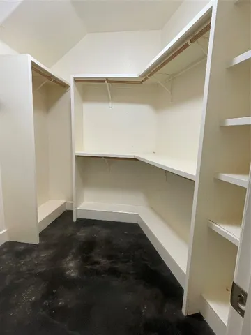 a empty room with wooden floor