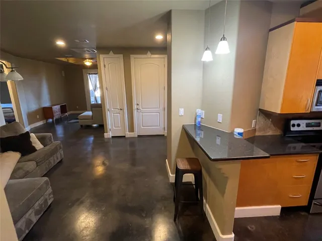 a view of a living room and dining room