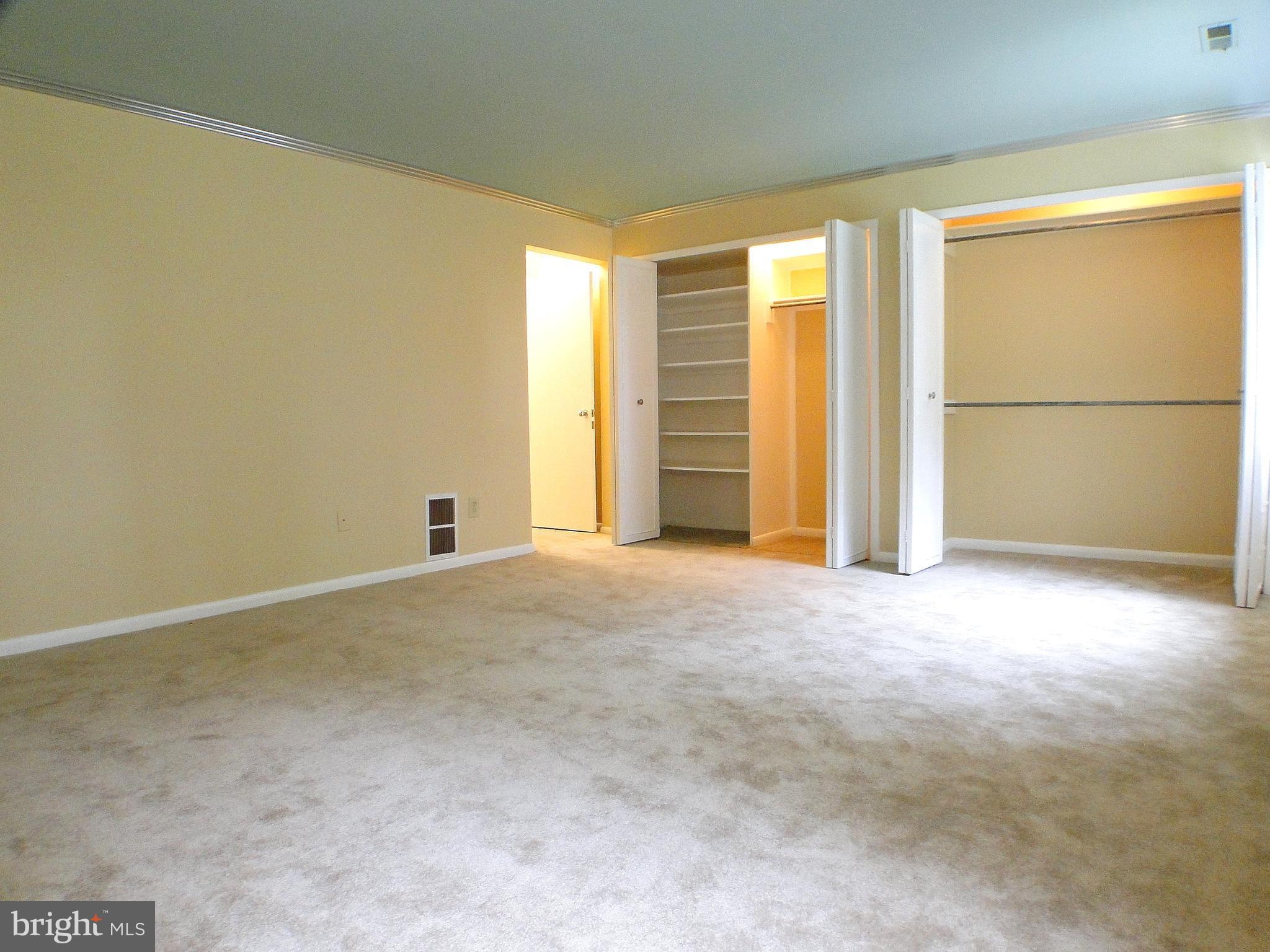 8232 Brattle Road Pikesville, MD 21208 - Photo 25 of 30 an empty room with windows