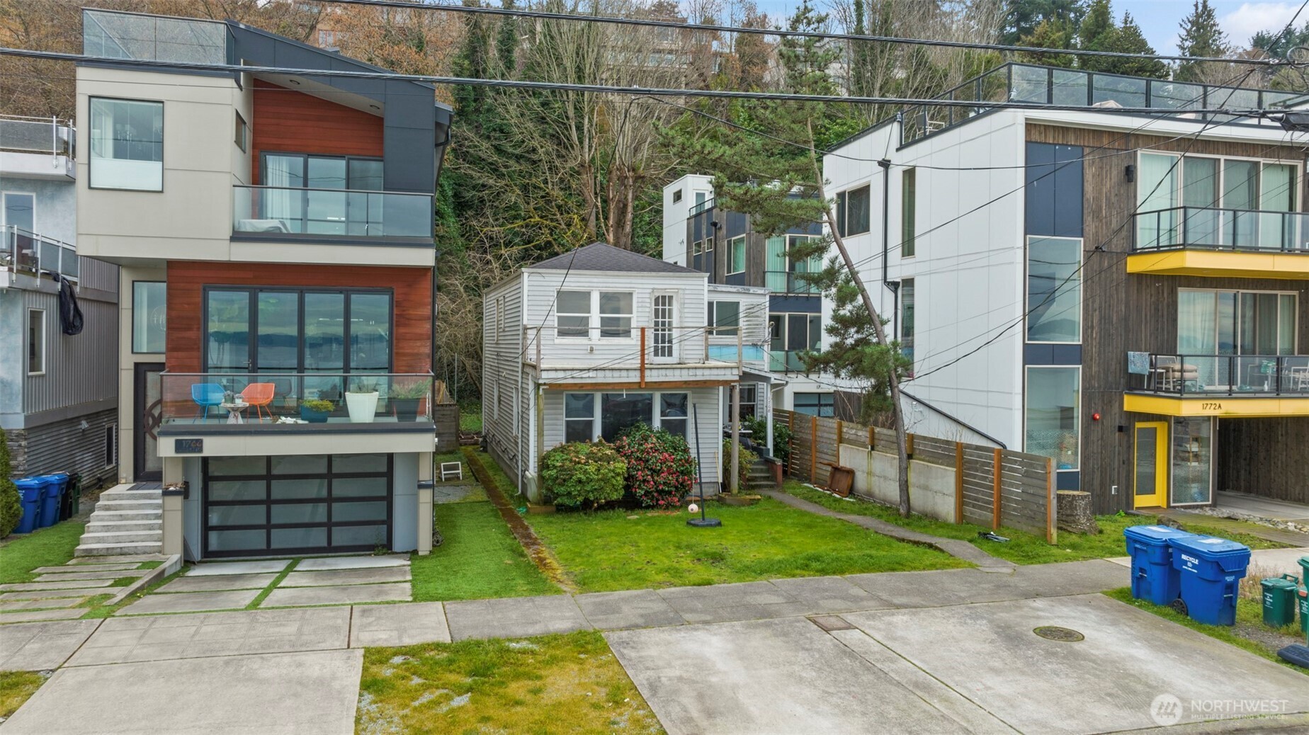 1768 Alki Avenue Southwest Seattle, WA 98116 - Photo 2 of 40 a house view with a garden space