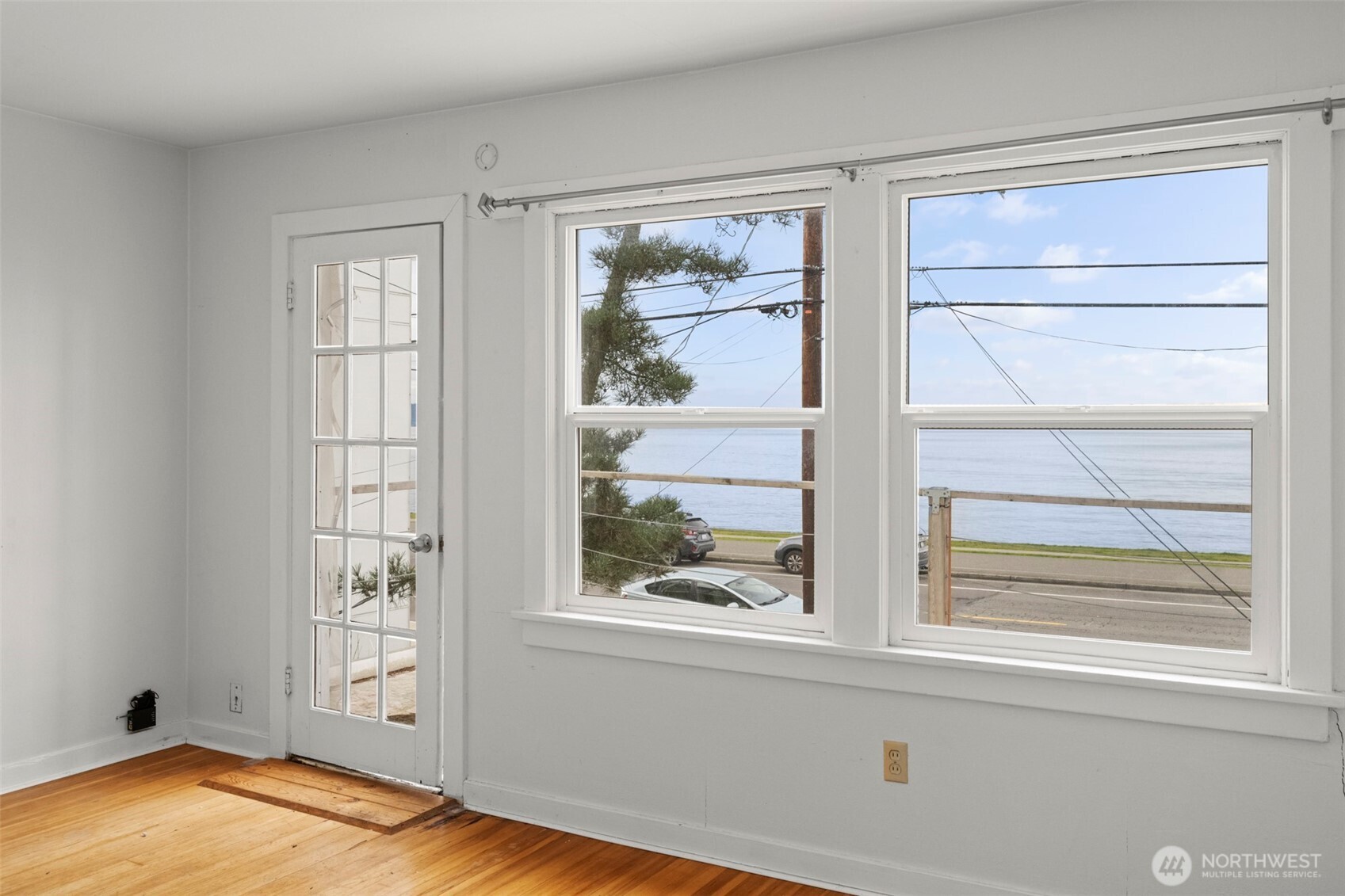 1768 Alki Avenue Southwest Seattle, WA 98116 - Photo 26 of 40 a view of an empty room with a window