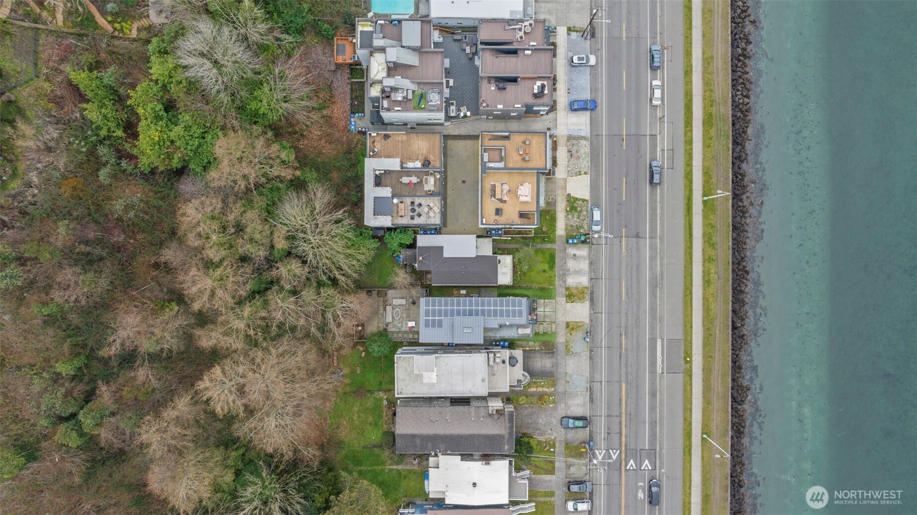 1768 Alki Avenue Southwest Seattle, WA 98116 - Photo 37 of 40 an aerial view of a residential apartment building with a yard