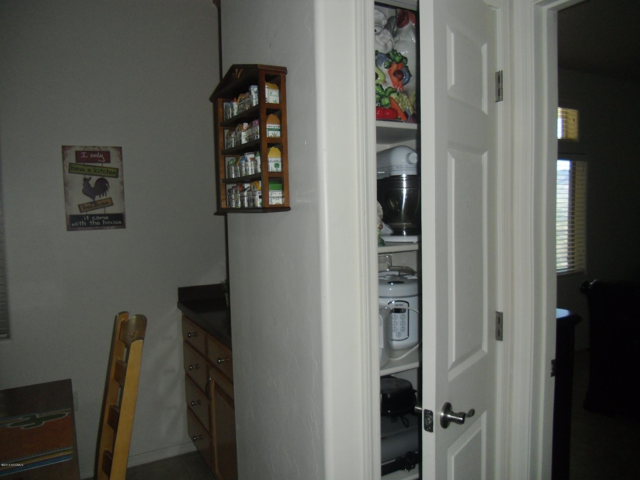 942 Via Puebla Rio Rico, AZ 85648 - Photo 53 of 73 a view of a hallway with wooden floor and closet