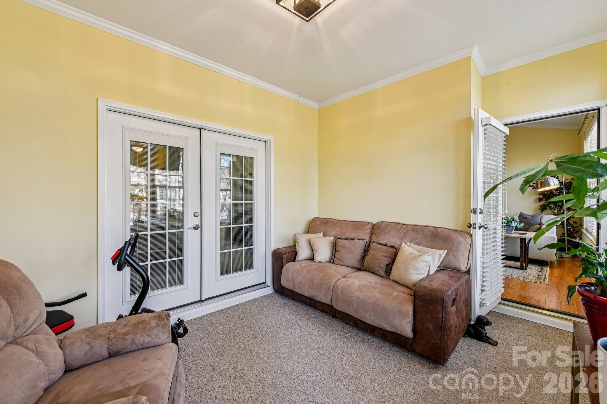 4700 Willow Glen Road Harrisburg, NC 28075 - Photo 21 of 29 a living room with furniture and a window