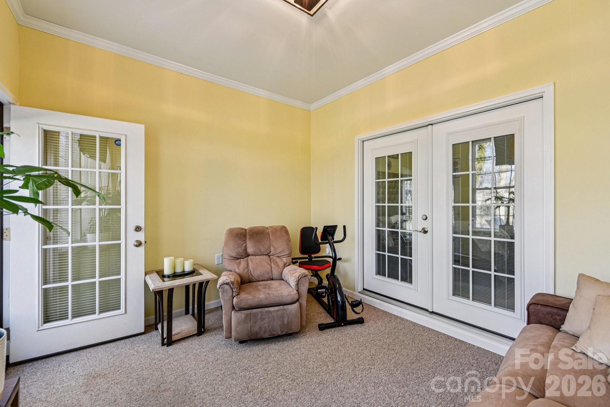 4700 Willow Glen Road Harrisburg, NC 28075 - Photo 22 of 29 a living room with furniture and a window