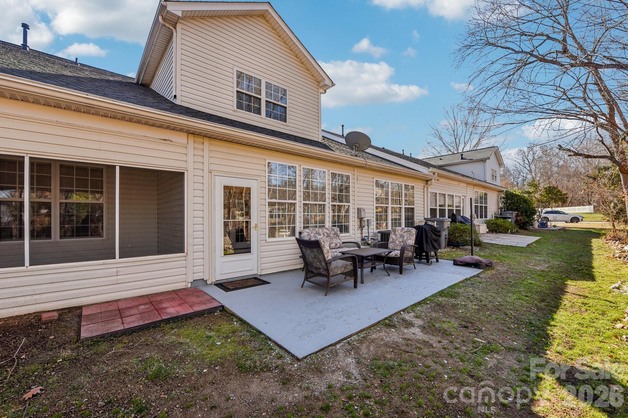 4700 Willow Glen Road Harrisburg, NC 28075 - Photo 23 of 29 a view of a house with patio