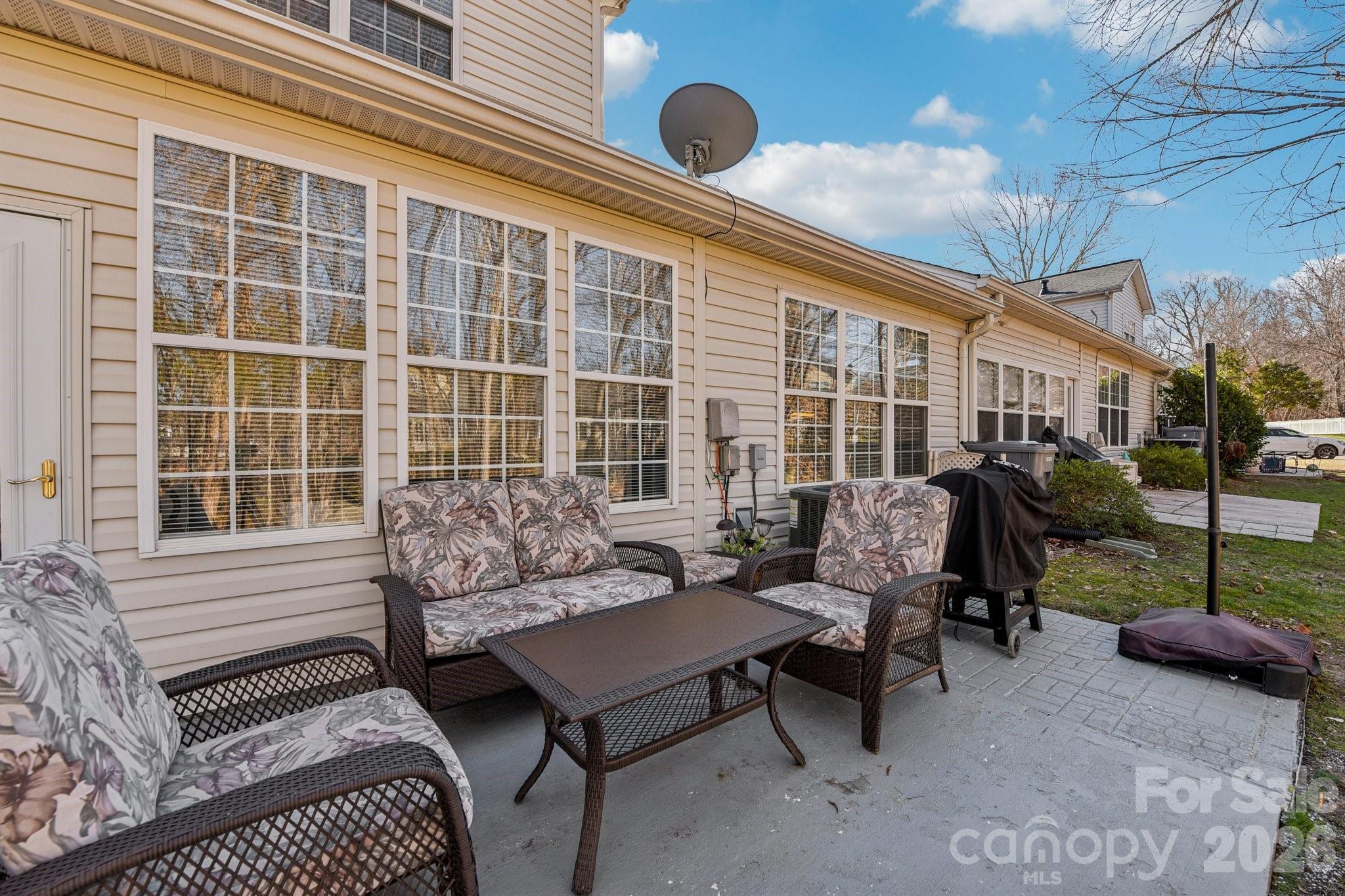 4700 Willow Glen Road Harrisburg, NC 28075 - Photo 24 of 29 a balcony with furniture and a window