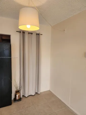 a view of entryway with chandelier