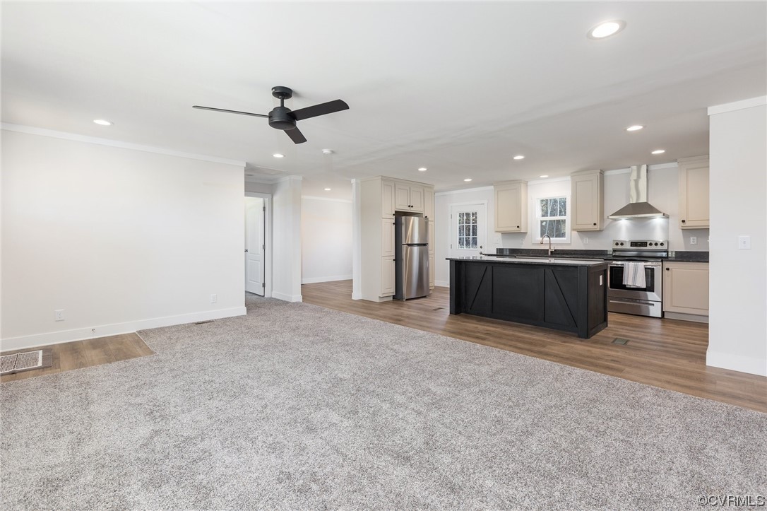 2011 Meherrin Road Meherrin, VA 23954 - Photo 13 of 37 a view of kitchen with kitchen island stainless steel appliances sink cabinets and stove top oven