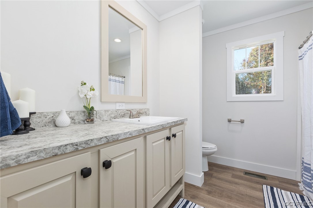 2011 Meherrin Road Meherrin, VA 23954 - Photo 29 of 37 a bathroom with a granite countertop sink and a mirror