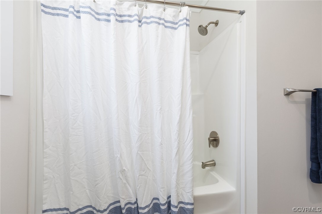 2011 Meherrin Road Meherrin, VA 23954 - Photo 30 of 37 a bathroom with a shower curtain and a shower curtain