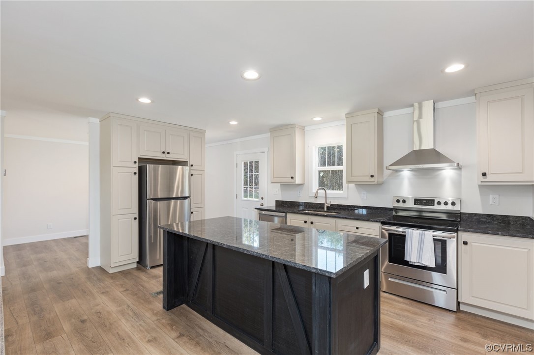 2011 Meherrin Road Meherrin, VA 23954 - Photo 9 of 37 a kitchen with stainless steel appliances granite countertop a stove a sink a refrigerator and white cabinets with wooden floor
