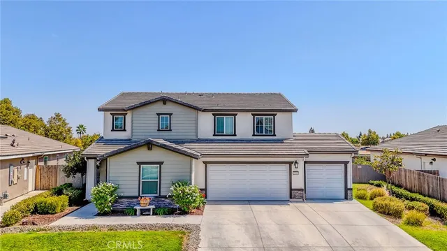 a house view with a garden space