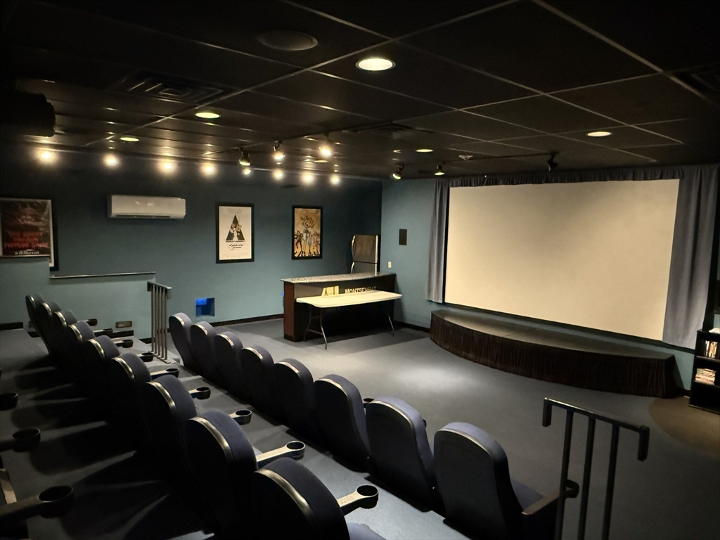 40 Heather Street, Unit 204 Beverly, MA 01915 - Photo 36 of 39 a projector room with gym equipment