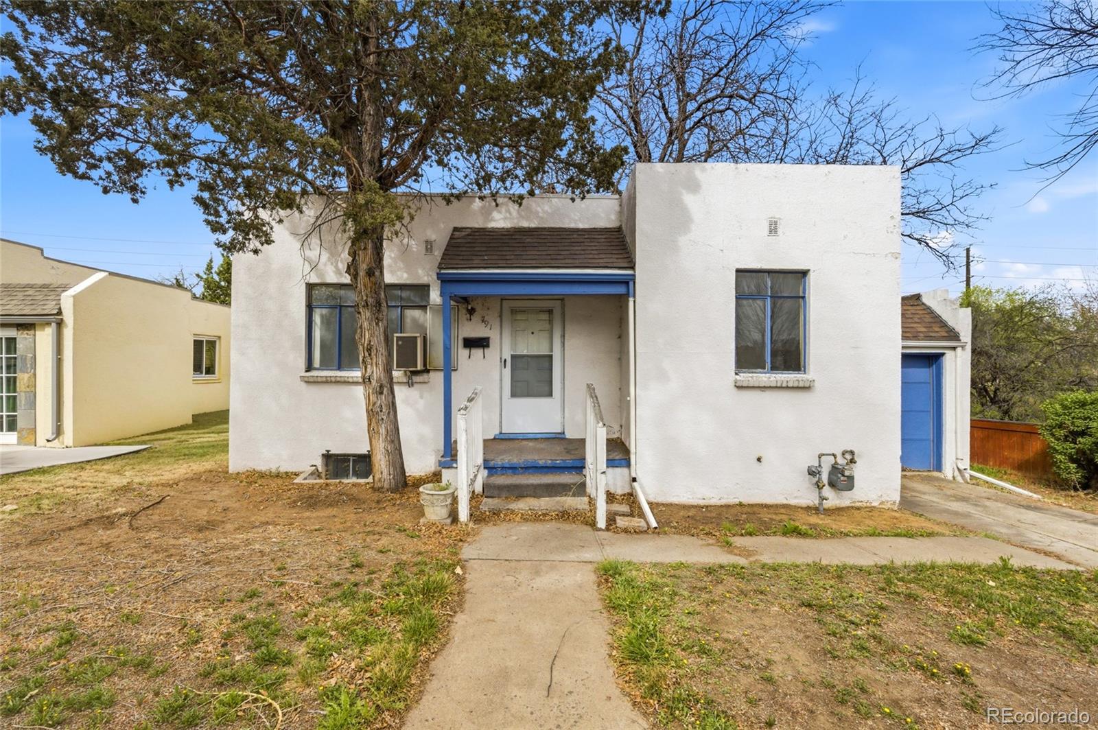 791 Quebec Street Denver, CO 80220 - Photo 1 of 17 a house view with a outdoor space