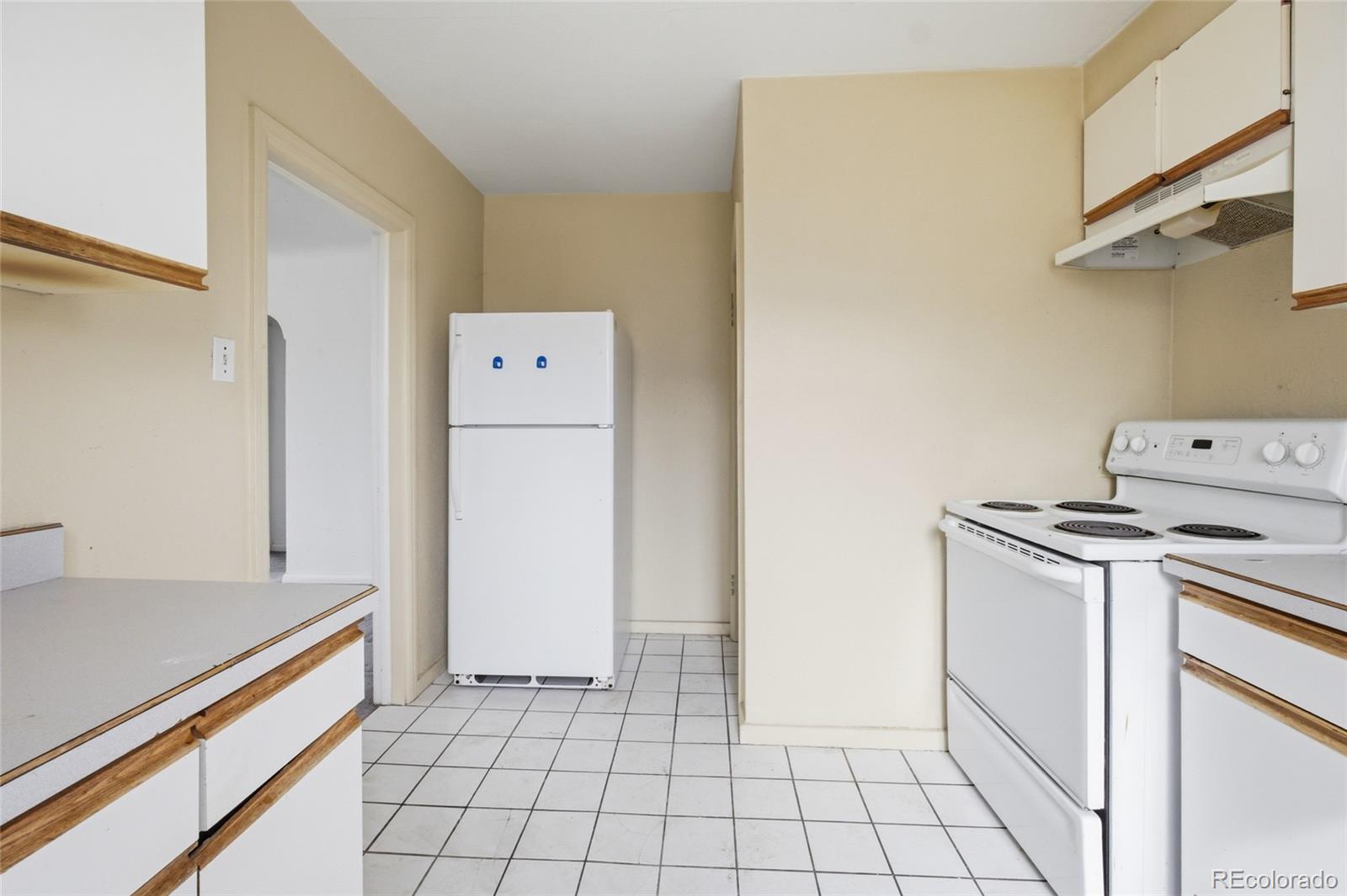 791 Quebec Street Denver, CO 80220 - Photo 5 of 17 a utility room with dryer and washer