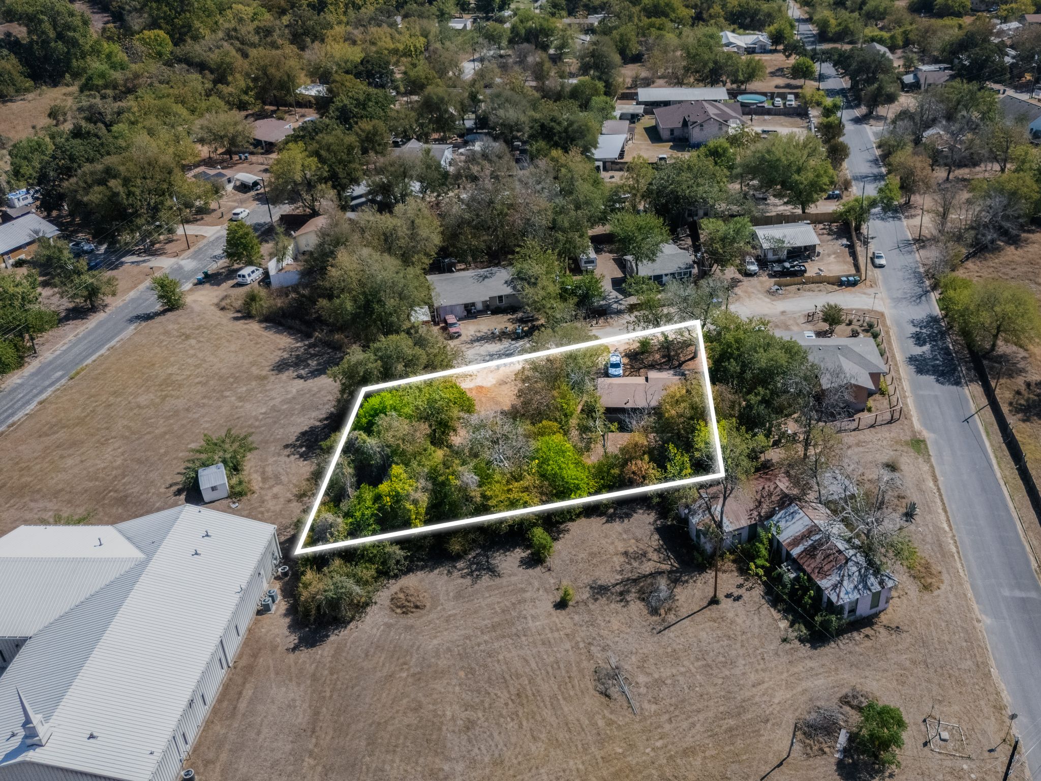 102 Masonic Drive Elgin, TX 78621 - Photo 8 of 12 an aerial view of residential house with outdoor space
