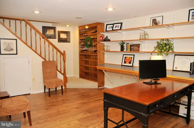 a view of a livingroom with furniture and a fireplace